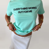 EVERYTHING WORKS OUT FOR ME GRAPHIC TEE