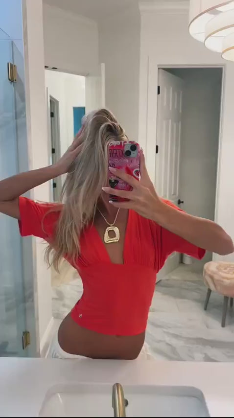 Community UGC row 430: ANNA DEEP V DRAPED SLEEVE TOP IN CORAL RED, PIEN NECKLACE