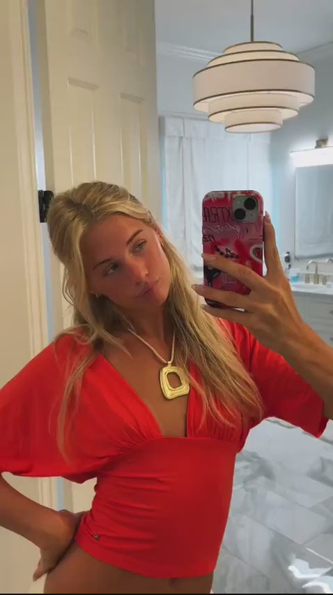 Community UGC row 427: ANNA DEEP V DRAPED SLEEVE TOP IN CORAL RED, PIEN NECKLACE