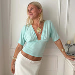 ANNA DEEP V DRAPED SLEEVE TOP IN AQUA - scandivv