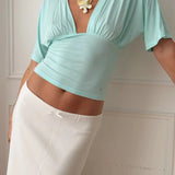 ANNA DEEP V DRAPED SLEEVE TOP IN AQUA - scandivv