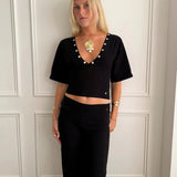 MAEVE SHELL BUTTONS V - NECK TOP IN BLACK - scandivv